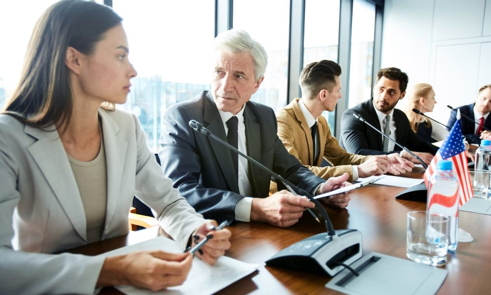 Pensive representative of governments advising each others